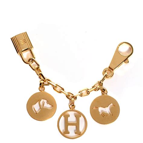 hermes gold bag charm